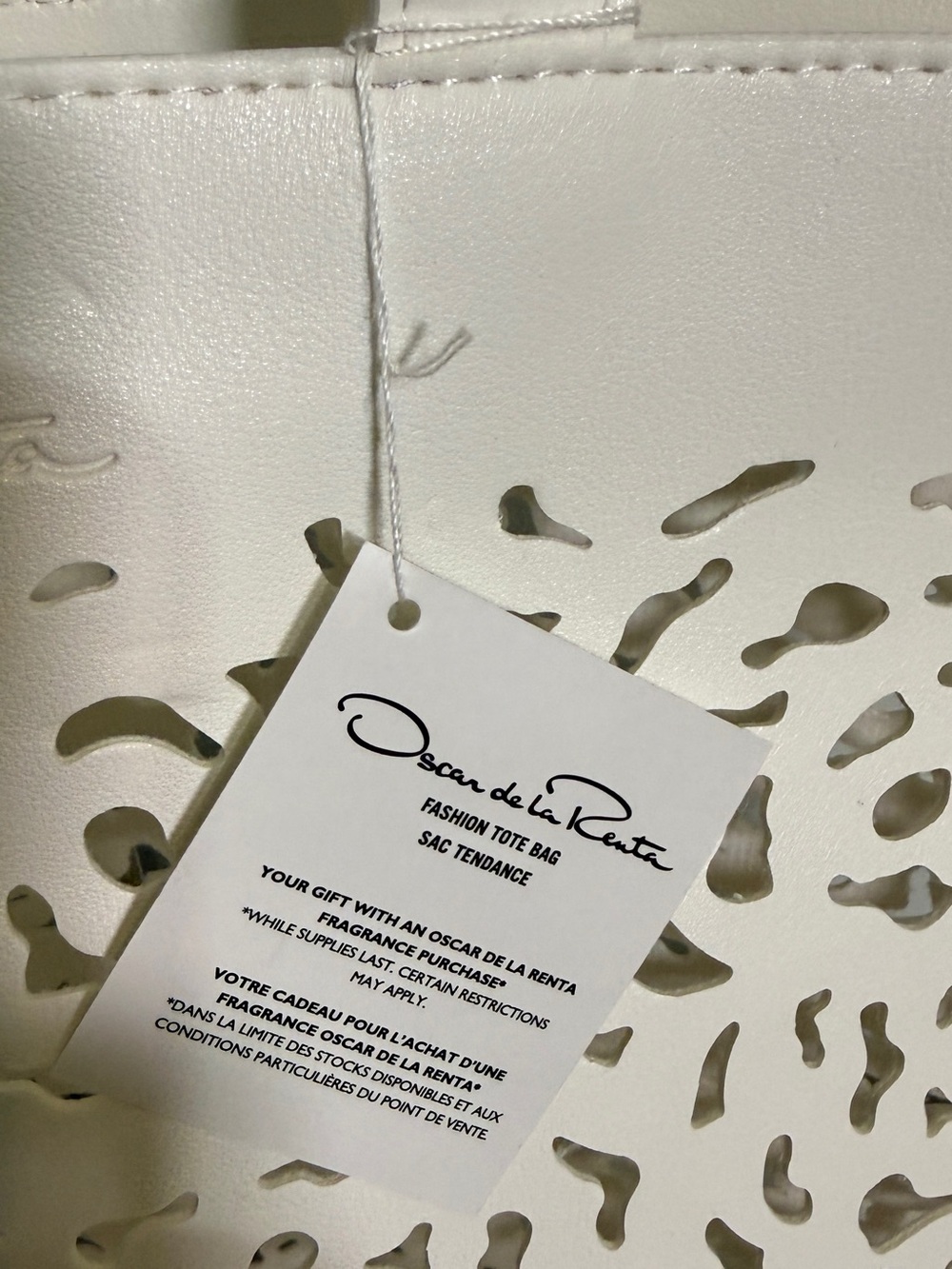 Oscar de la Renta Fragrance White Preforated Laser-Cut Tote Bag - Picture 2 of 16